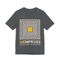 Gray t-shirt with geometric design and 'UNCOMPRESSED' text on a white background