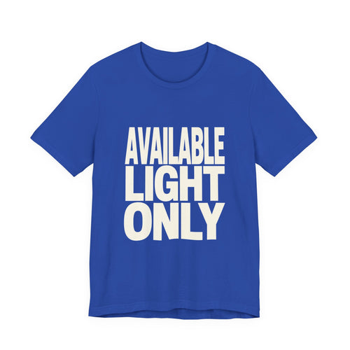 Blue t-shirt with 'AVAILABLE LIGHT ONLY' text on a white background