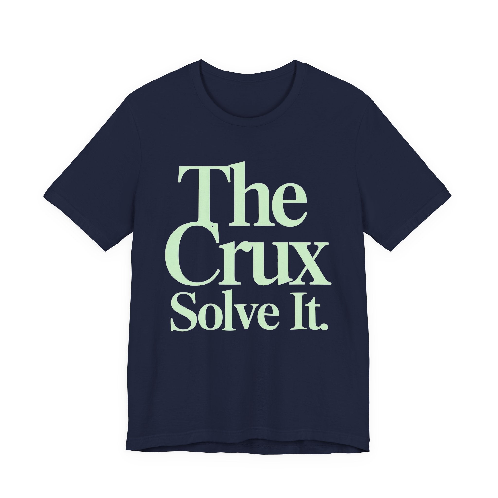 Navy t-shirt with 'The Crux Solve It' text in light green on a white background.