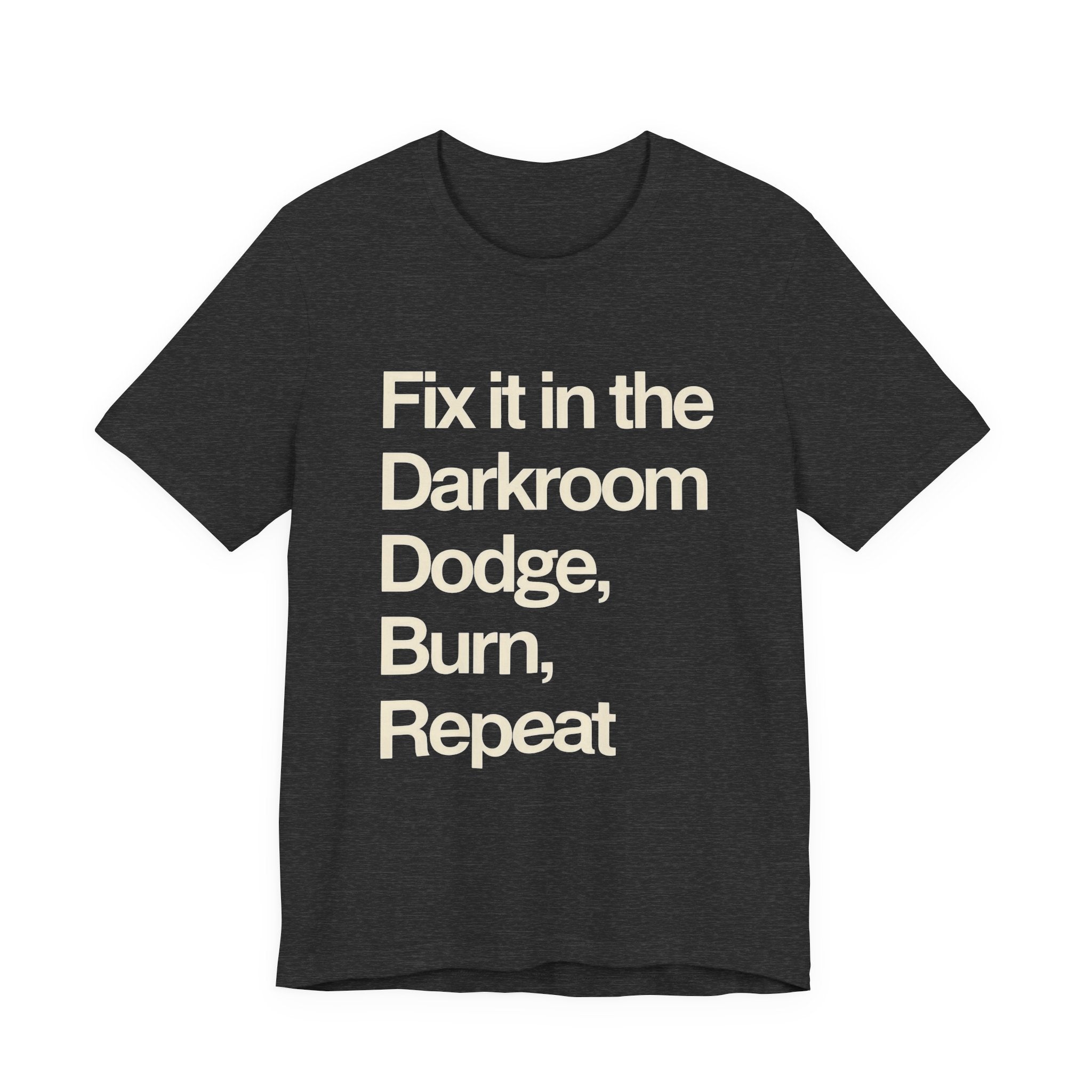 Black t-shirt with white text 'Fix it in the Darkroom Dodge, Burn, Repeat' on a white background