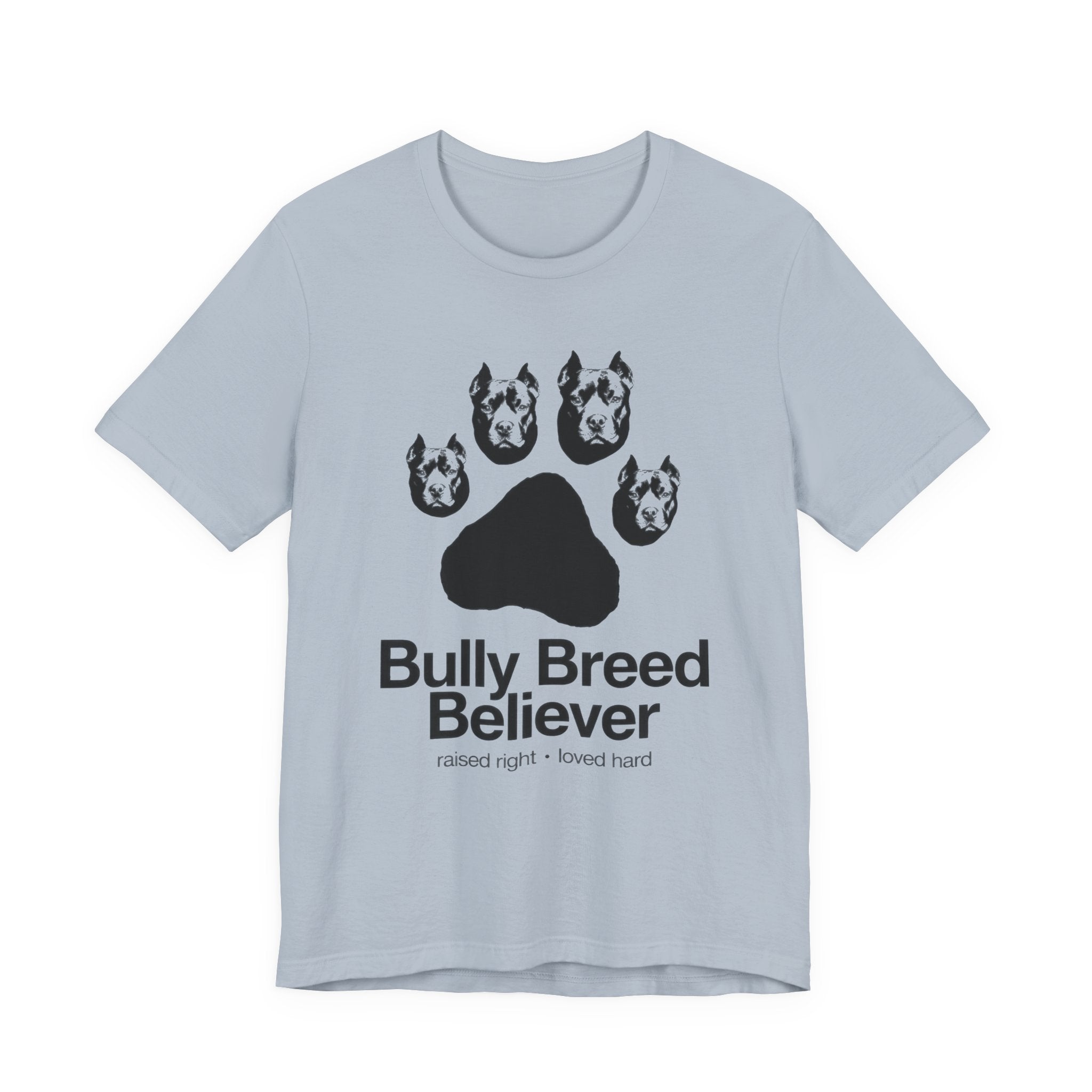 Light blue t-shirt with graphic of dog heads and text 'Bully Breed Believer' on a white background