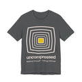 Gray t-shirt with a geometric design and 'uncompressed' text on a white background