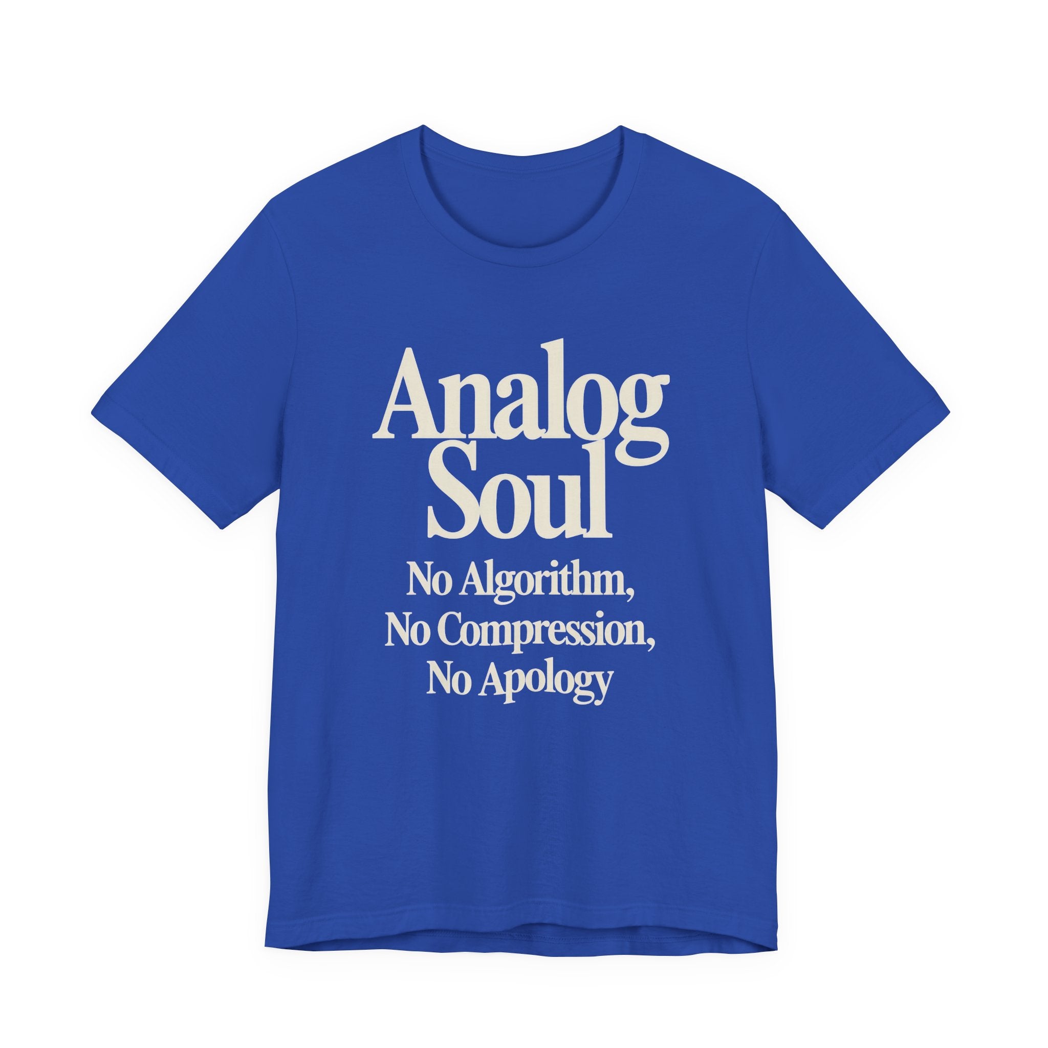 Blue t-shirt with white text 'Analog Soul: No Algorithm, No Compression, No Apology' on a white background