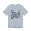 Light blue t-shirt with 'From the Original Thirteen' text and flag design 