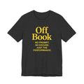 Black t-shirt with yellow text 'Off Book: No Prompt, No Excuse, Just the Performance' on a white background