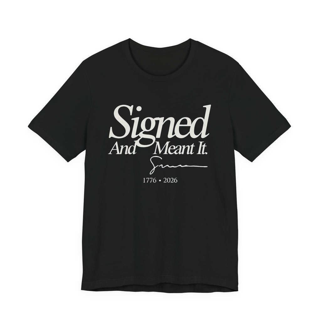Dark grey t-shirt with white text 'Signed And Meant It. 1776 - 2026' 