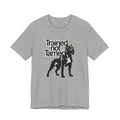 Gray t-shirt with a black dog graphic and 'Trained Not Tamed' text on a white background