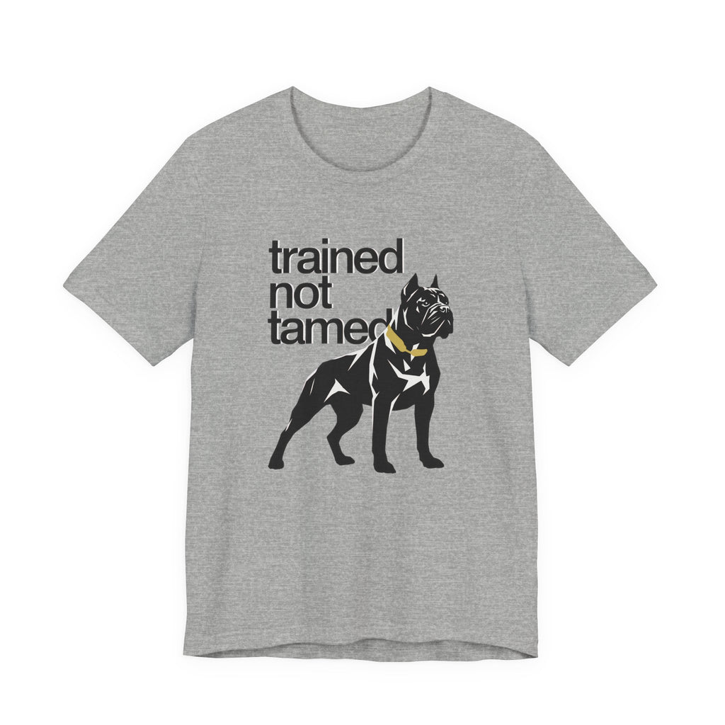 Gray t-shirt with black dog graphic and text 'trained not tamed' on a white background