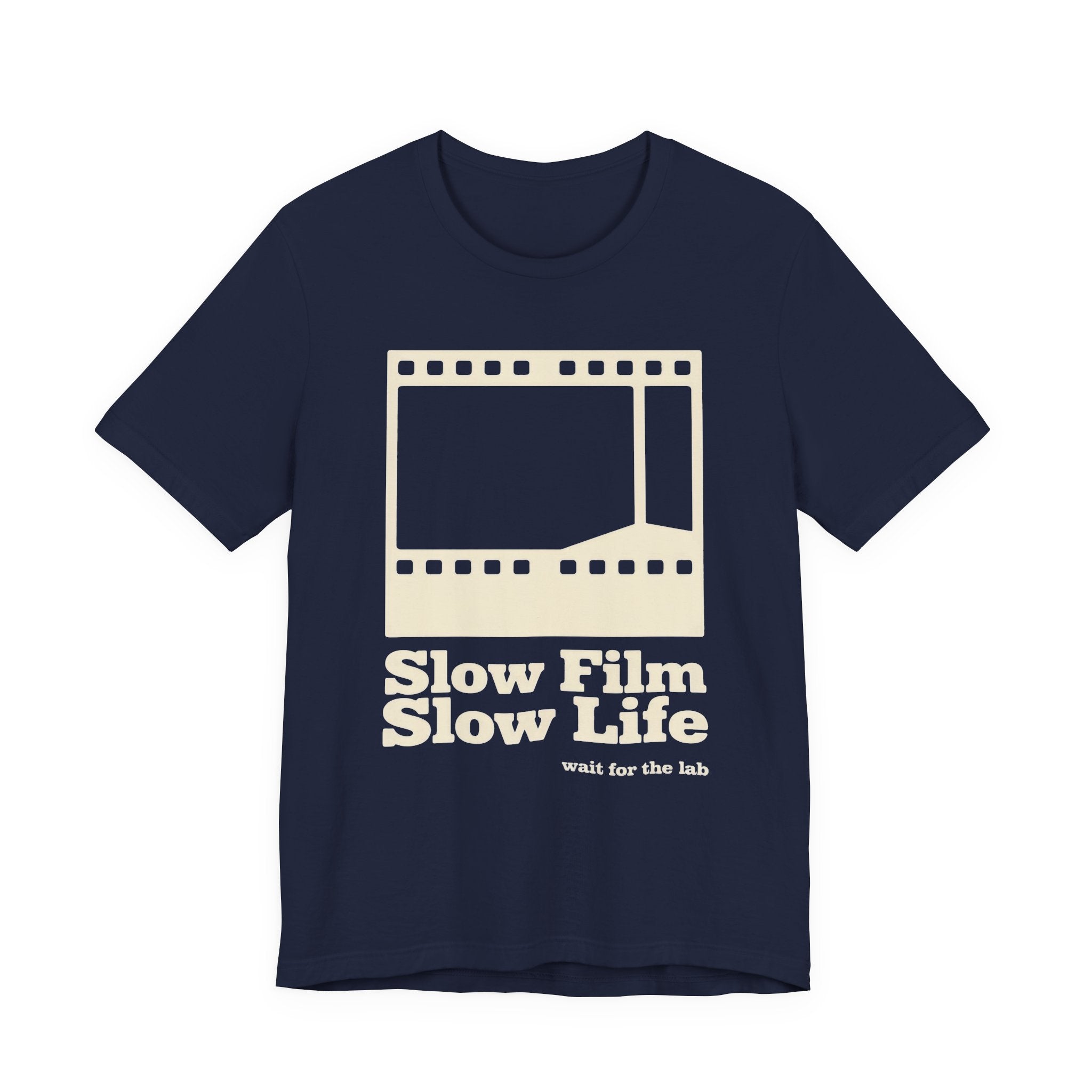 Navy t-shirt with a film strip graphic and text 'Slow Film Slow Life' on a white background
