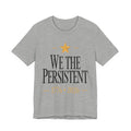Gray t-shirt with 'We the Persistent' text and star design on a white background