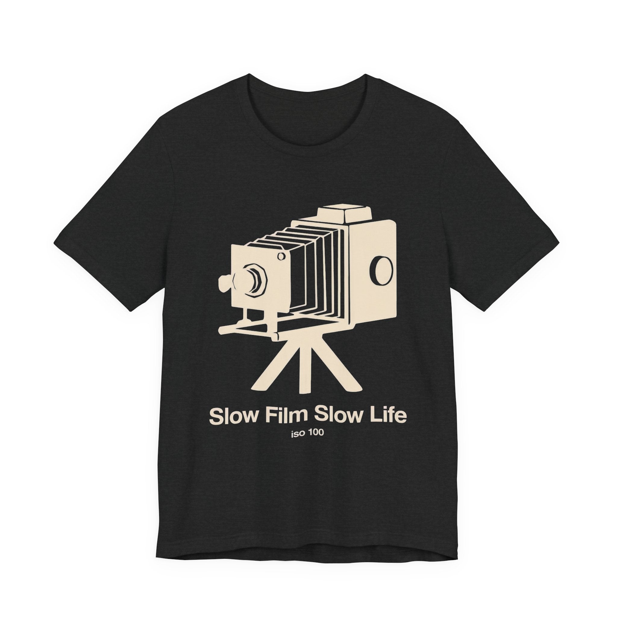 Black t-shirt with a vintage camera graphic and 'SLOW FILM SLOW LIFE' text on a white background