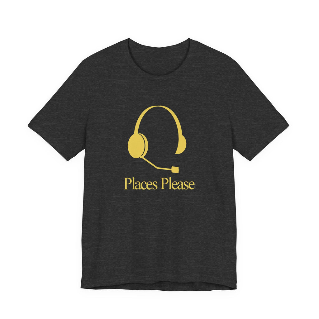 Black t-shirt with yellow headset graphic and 'Places Please' text on a white background