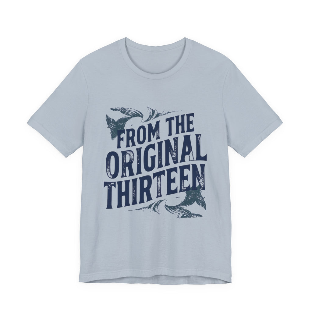 Light blue t-shirt with dark text and graphics 