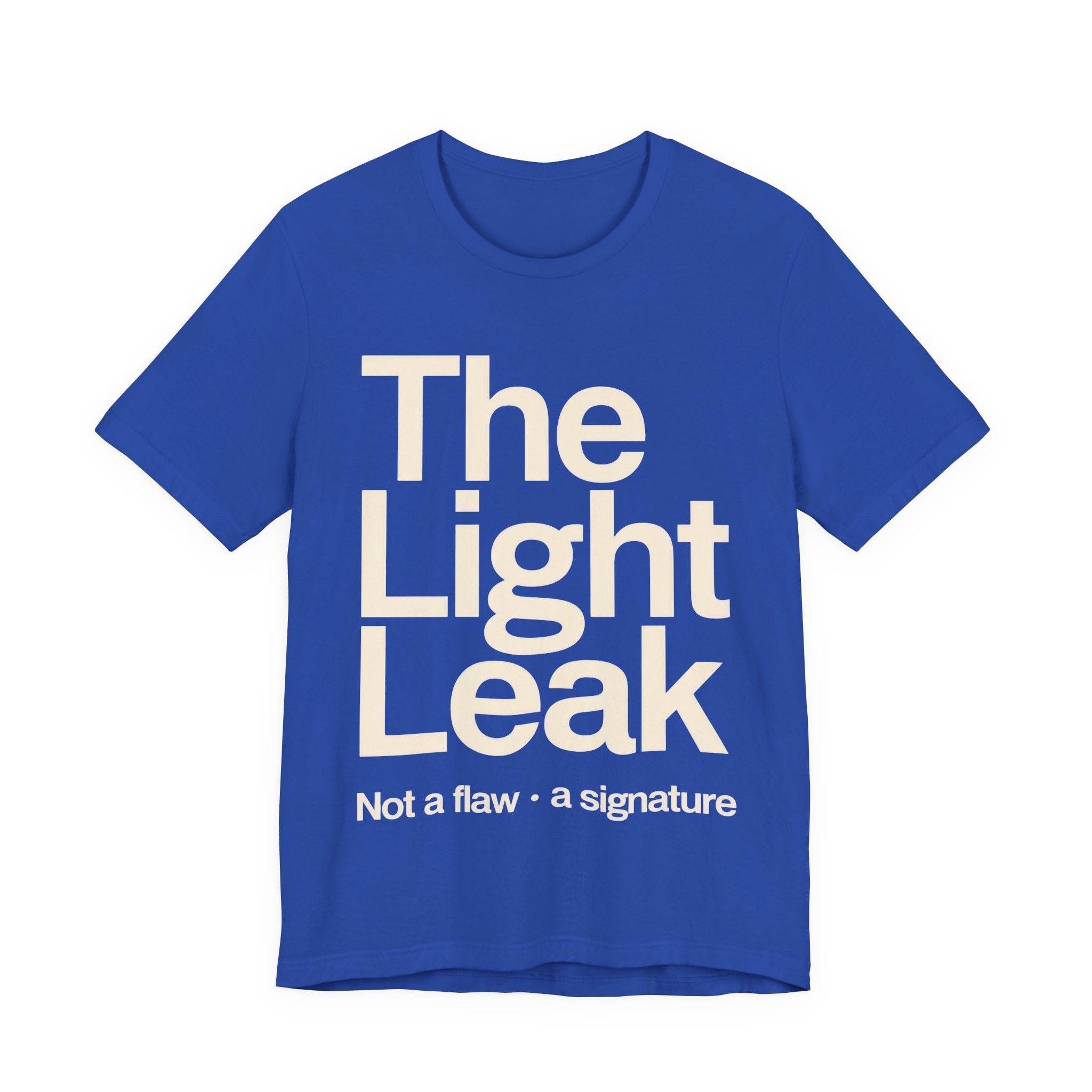 Light blue t-shirt with 'The Light Leak Not a flaw, a signature' text on a white background