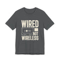 Gray t-shirt with 'WIRED NOT WIRELESS' text and cassette tape graphic on a white background