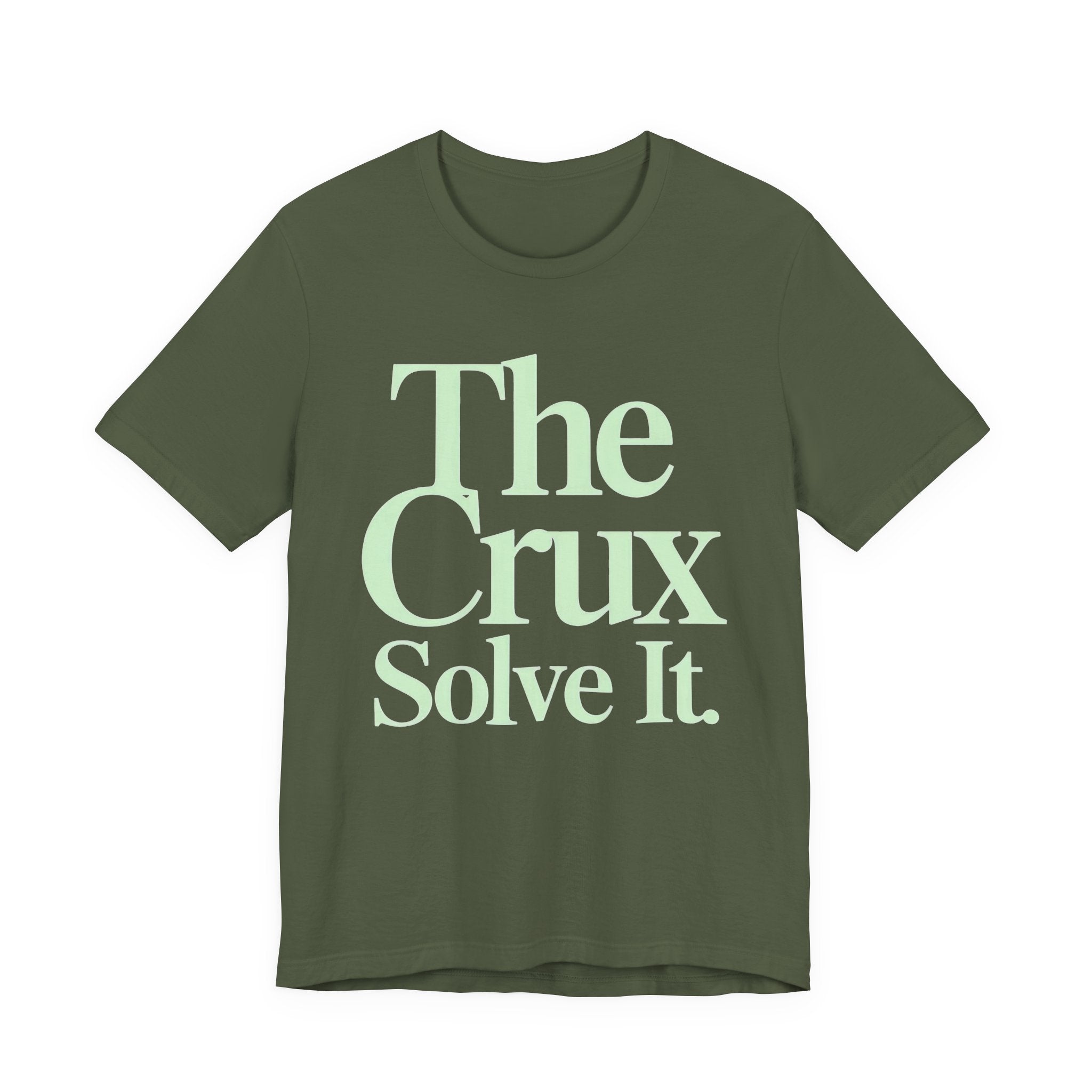 Green t-shirt with 'The Crux Solve It' text on a white background