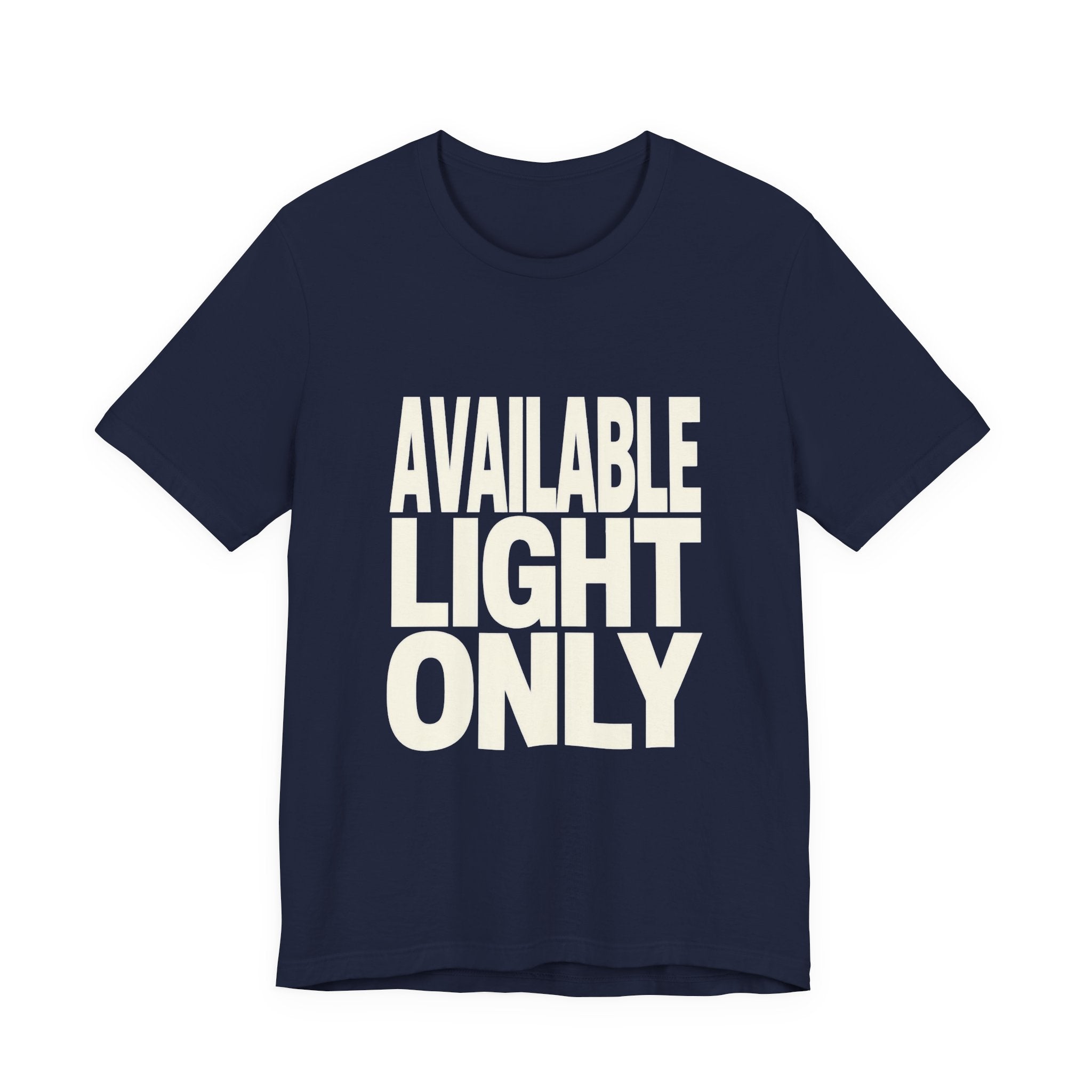 Navy t-shirt with 'AVAILABLE LIGHT ONLY' text on a white background