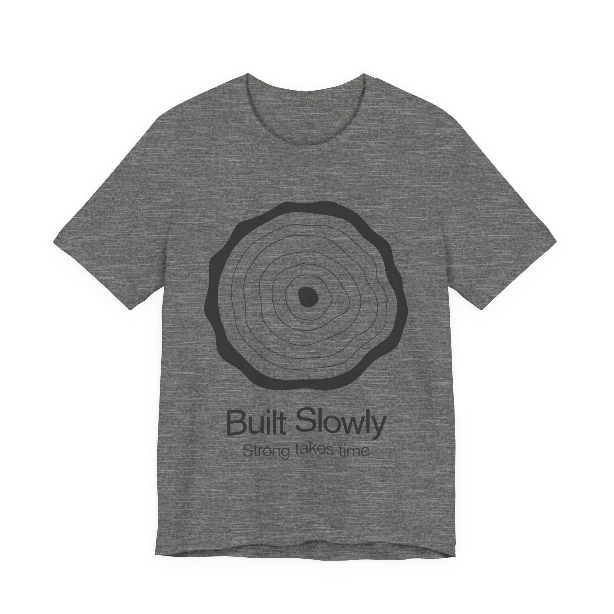 Gray t-shirt with a tree ring design and text on a white background