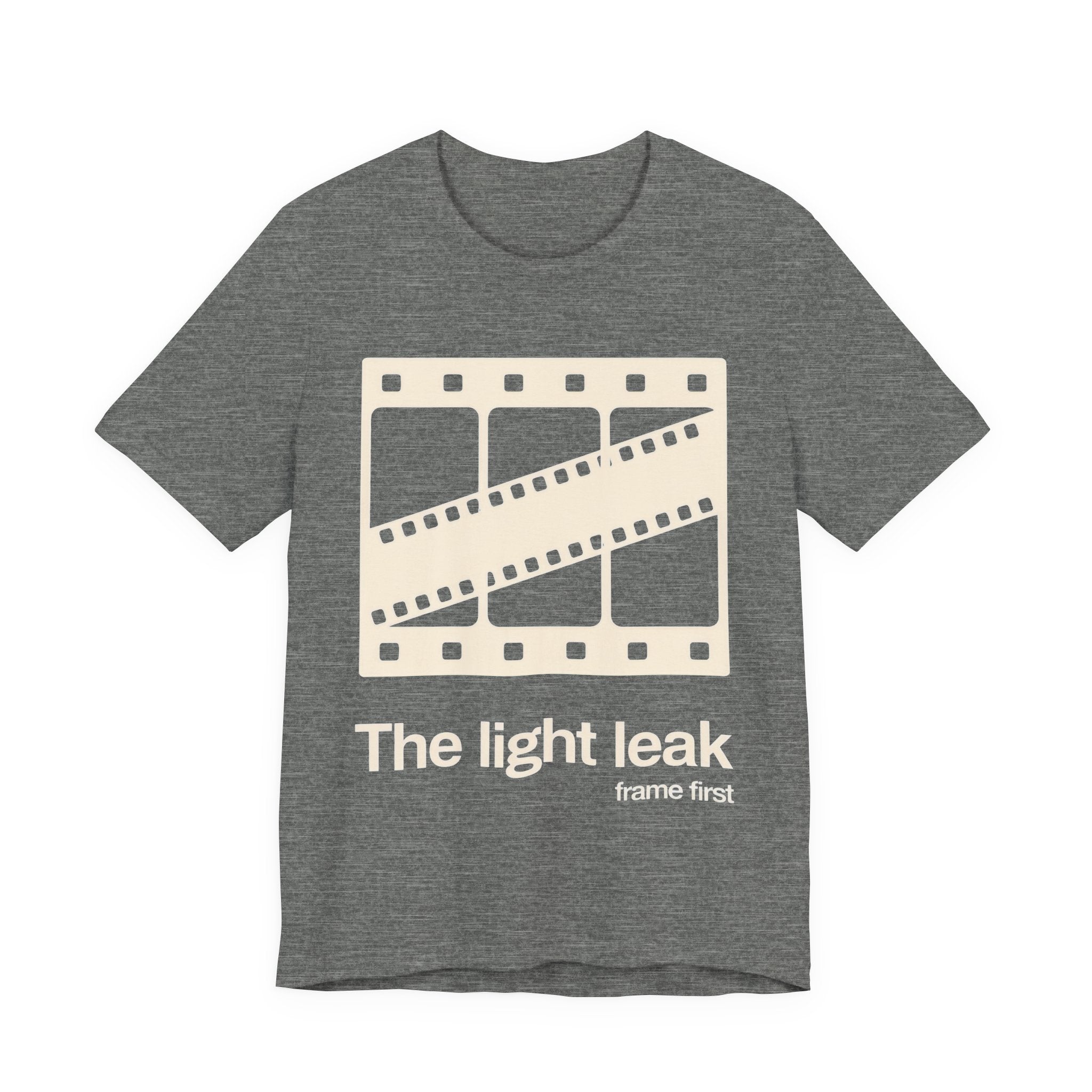 Gray t-shirt with a film reel design and white 'The light leak frame first' text on a white background