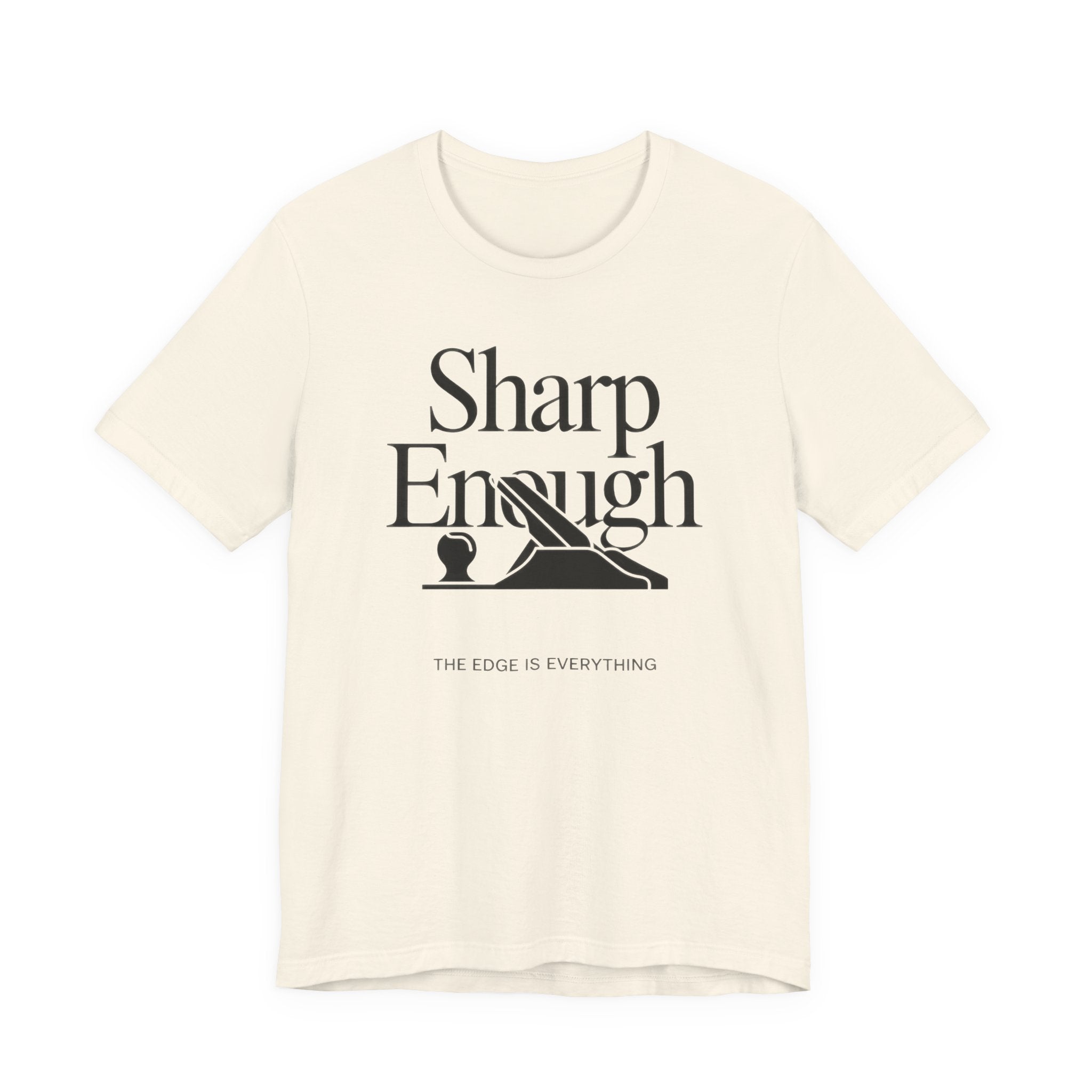 Beige t-shirt with 'Sharp Enough' graphic design on a white 