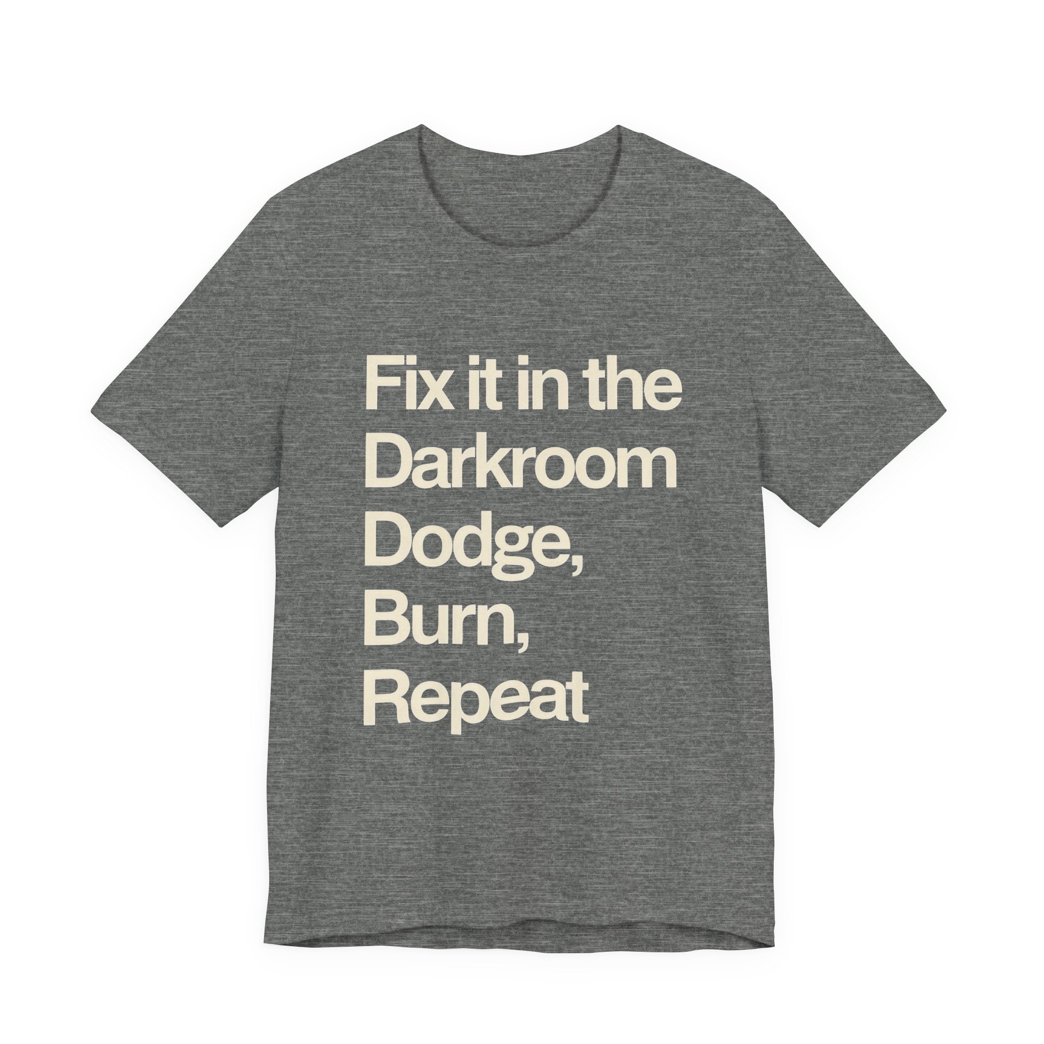 Gray t-shirt with white text 'Fix it in the Darkroom Dodge, Burn, Repeat' on a white background