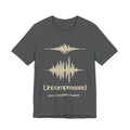 Gray t-shirt with beige sound wave design and 'Uncompressed Full Dynamic Range' text.