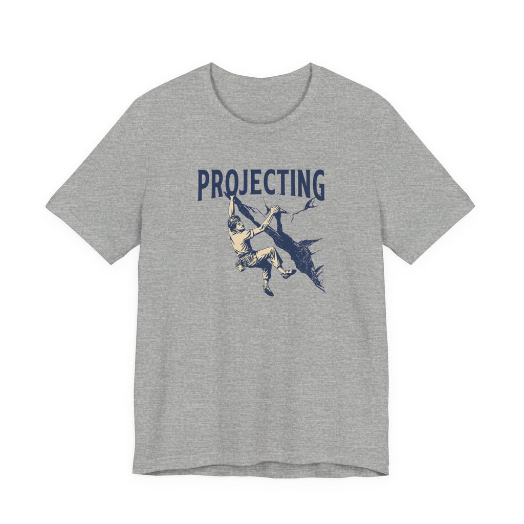 Gray t-shirt with 'PROJECTING' graphic design on a white background