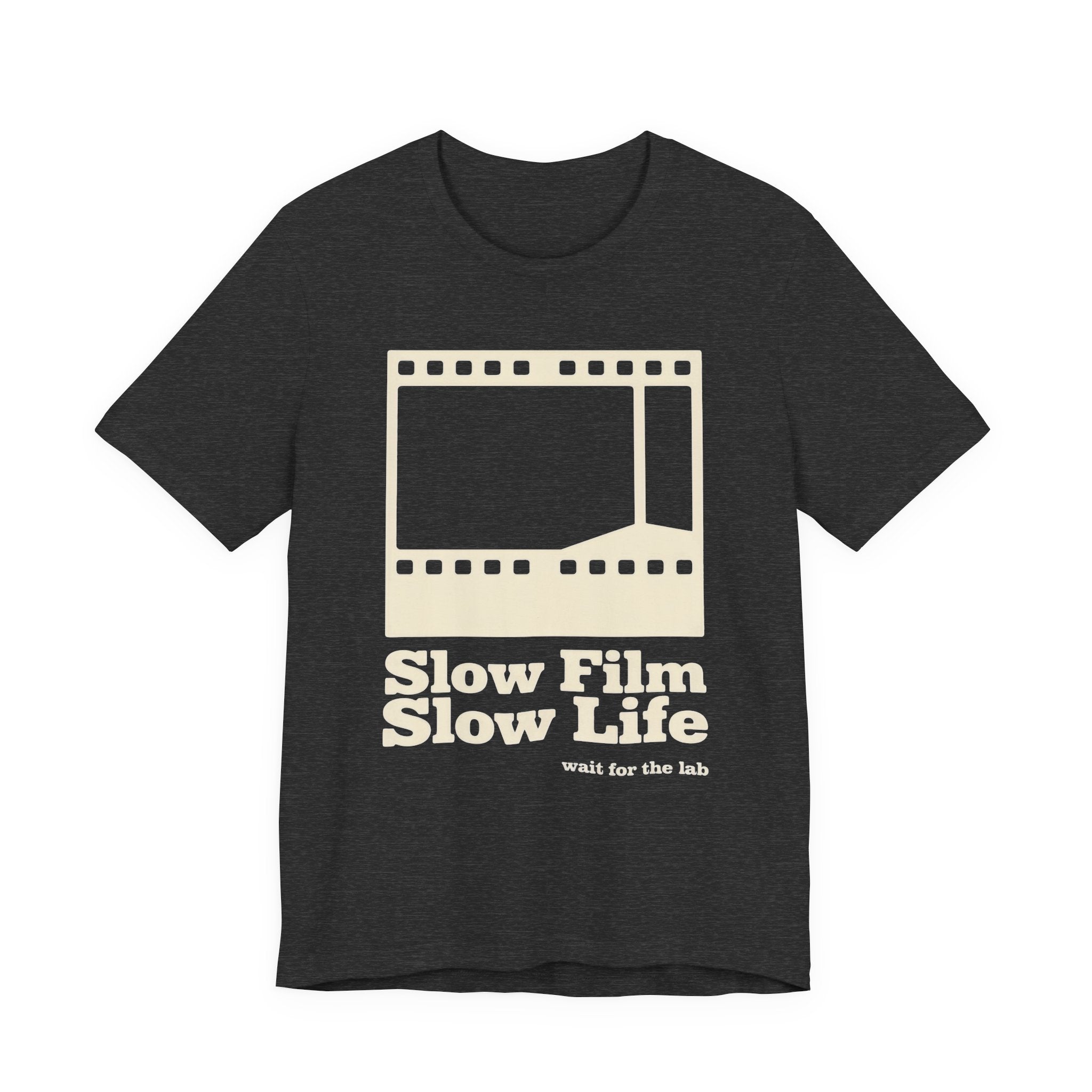 Black t-shirt with a film strip graphic and text 'Slow Film Slow Life' on a white background