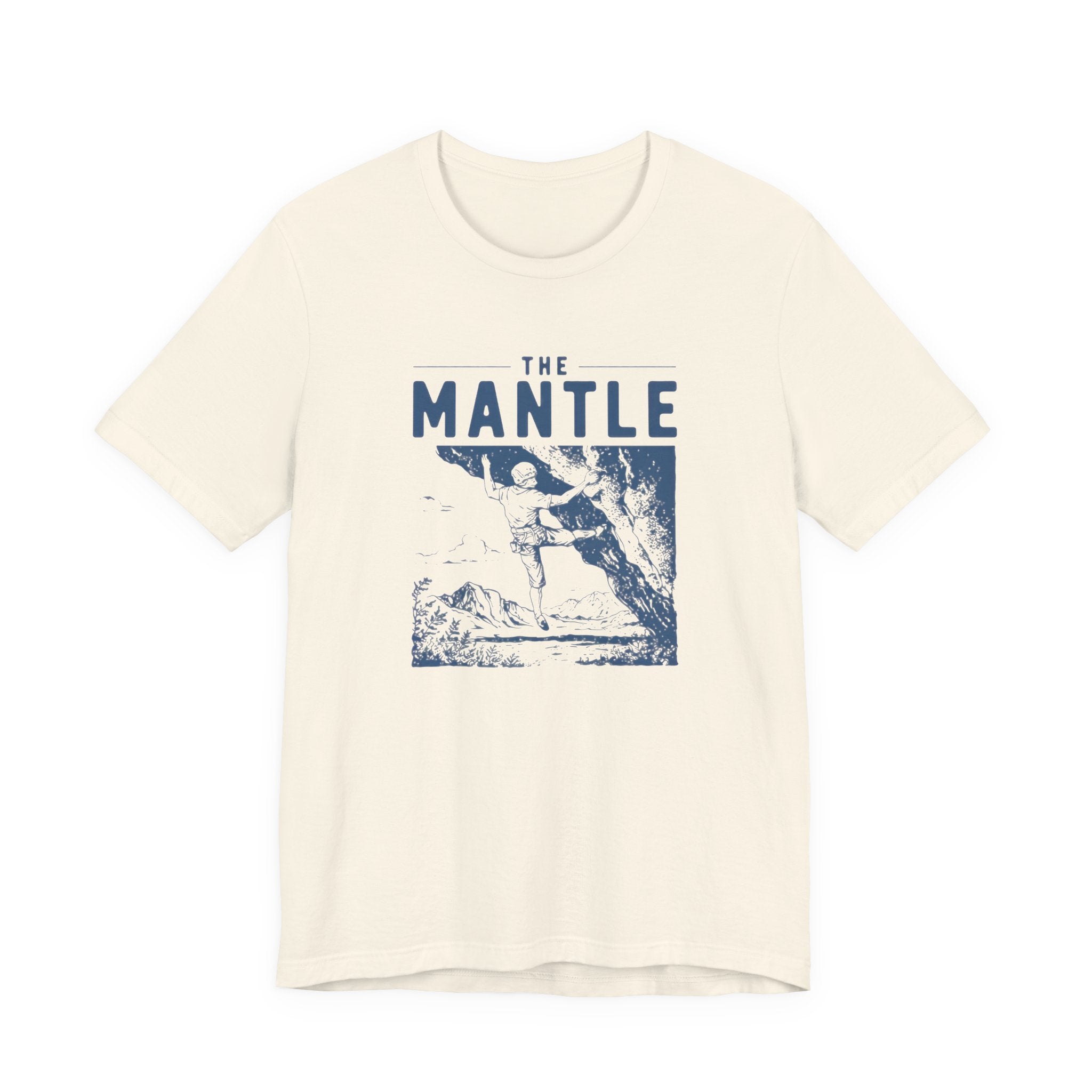 Beige t-shirt with 'The Mantle' graphic design on a white background