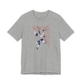 Gray t-shirt with a graphic of a climber on a rock face on a white background