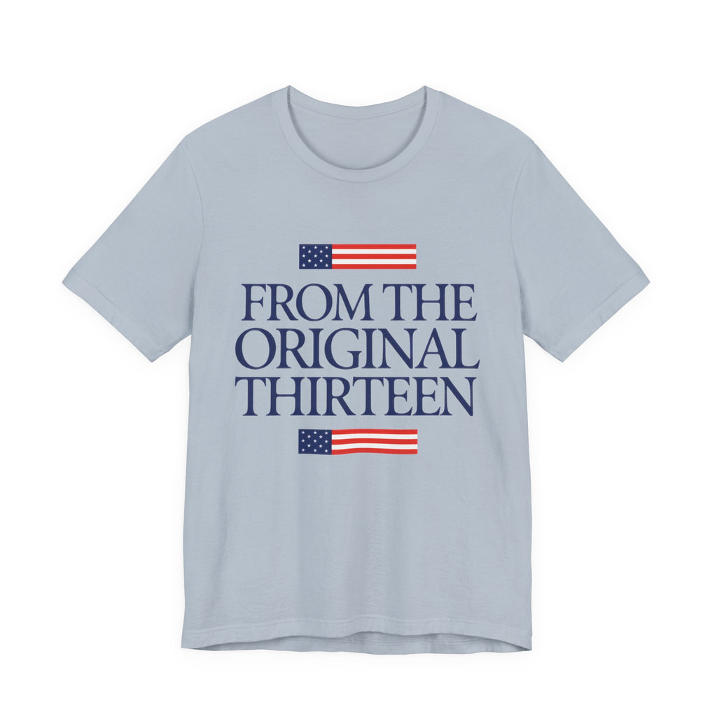 Light blue t-shirt with American flag graphics and text