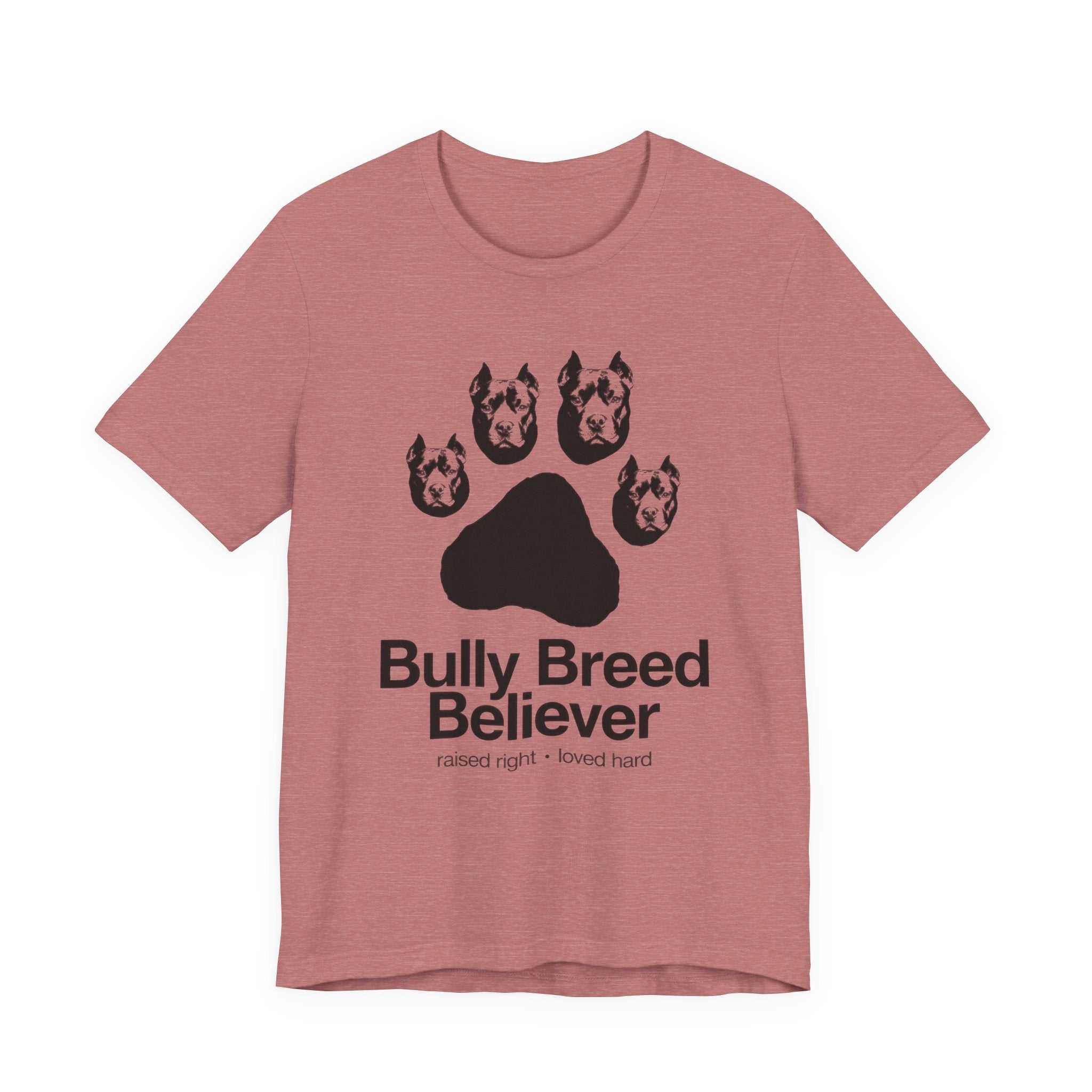 Mauve t-shirt with graphic of dog heads and text 'Bully Breed Believer' on a white background