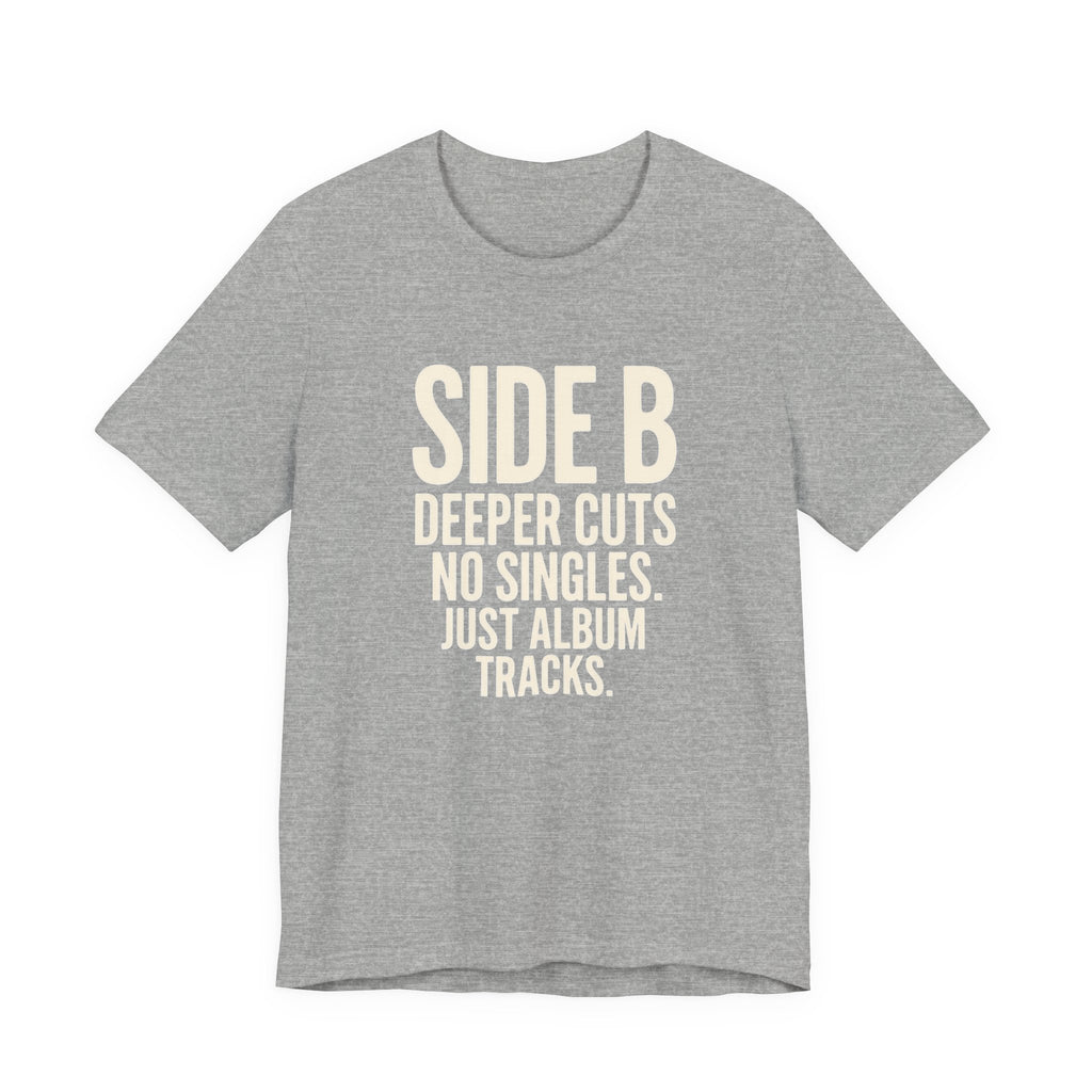 Gray t-shirt with white Black t-shirt with white 'SIDE B DEEPER CUTS NO SINGLES. JUST ALBUM TRACKS.' text on a white background