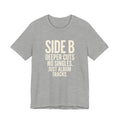 Gray t-shirt with white Black t-shirt with white 'SIDE B DEEPER CUTS NO SINGLES. JUST ALBUM TRACKS.' text on a white background