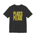 Black t-shirt with yellow text 'PLACES PLEASE' on a white background