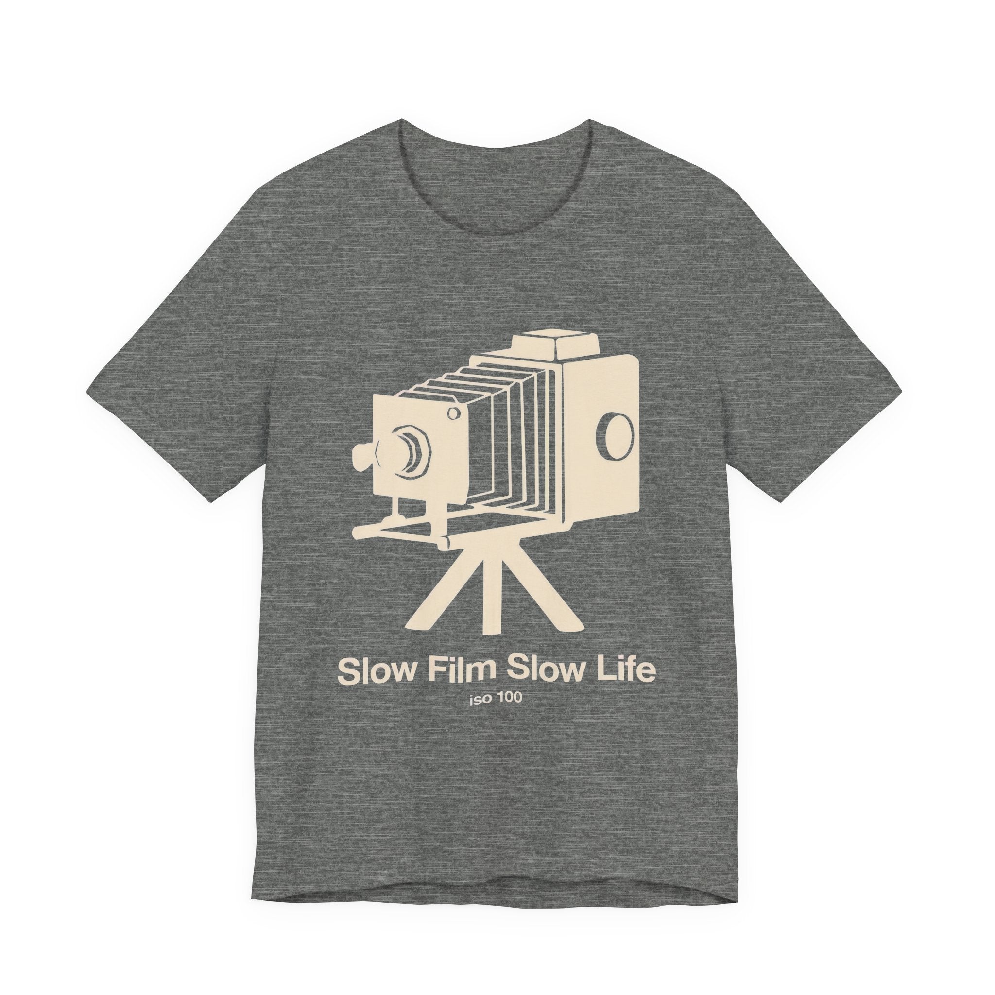 Gray t-shirt with a vintage camera graphic and 'SLOW FILM SLOW LIFE' text on a white background