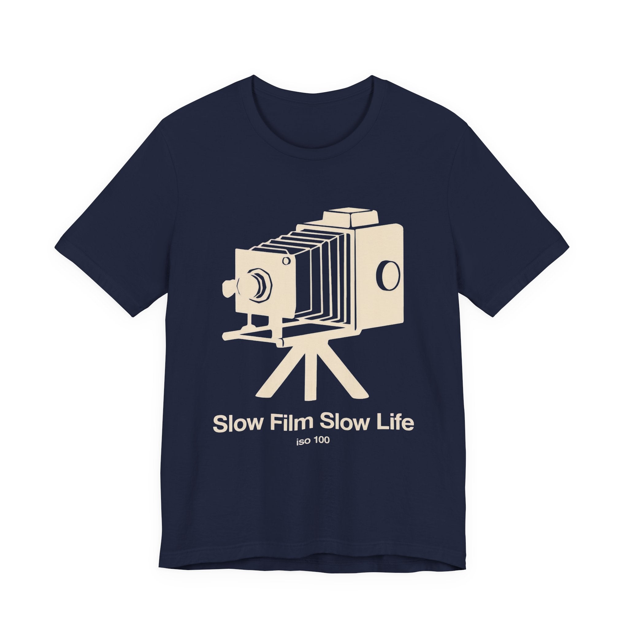 Navy t-shirt with a vintage camera graphic and 'SLOW FILM SLOW LIFE' text on a white background