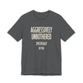 Light grey t-shirt with text 'AGGRESSIVELY UNBOTHERED SPECIFICALLY BY YOU' on a white background