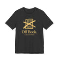 Black t-shirt with gold 'Off Book' logo and text on a white background
