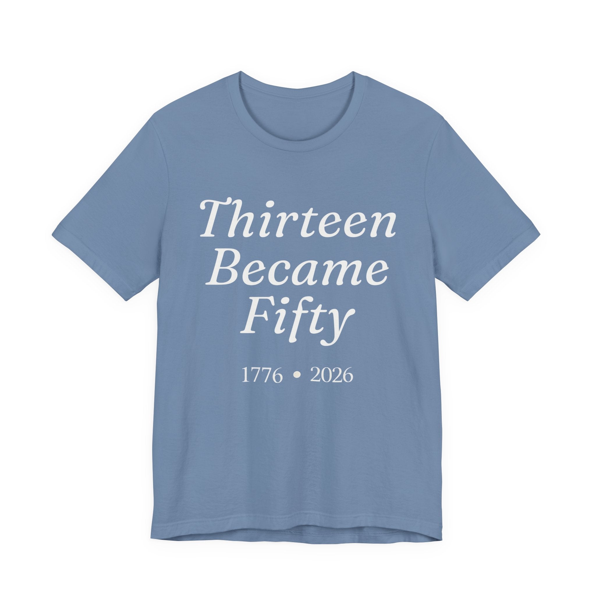 Blue t-shirt with white text 'Thirteen Became Fifty 1776 • 2026' 
