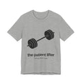 Gray t-shirt with a barbell graphic and 'the patient lifter' text on a white background