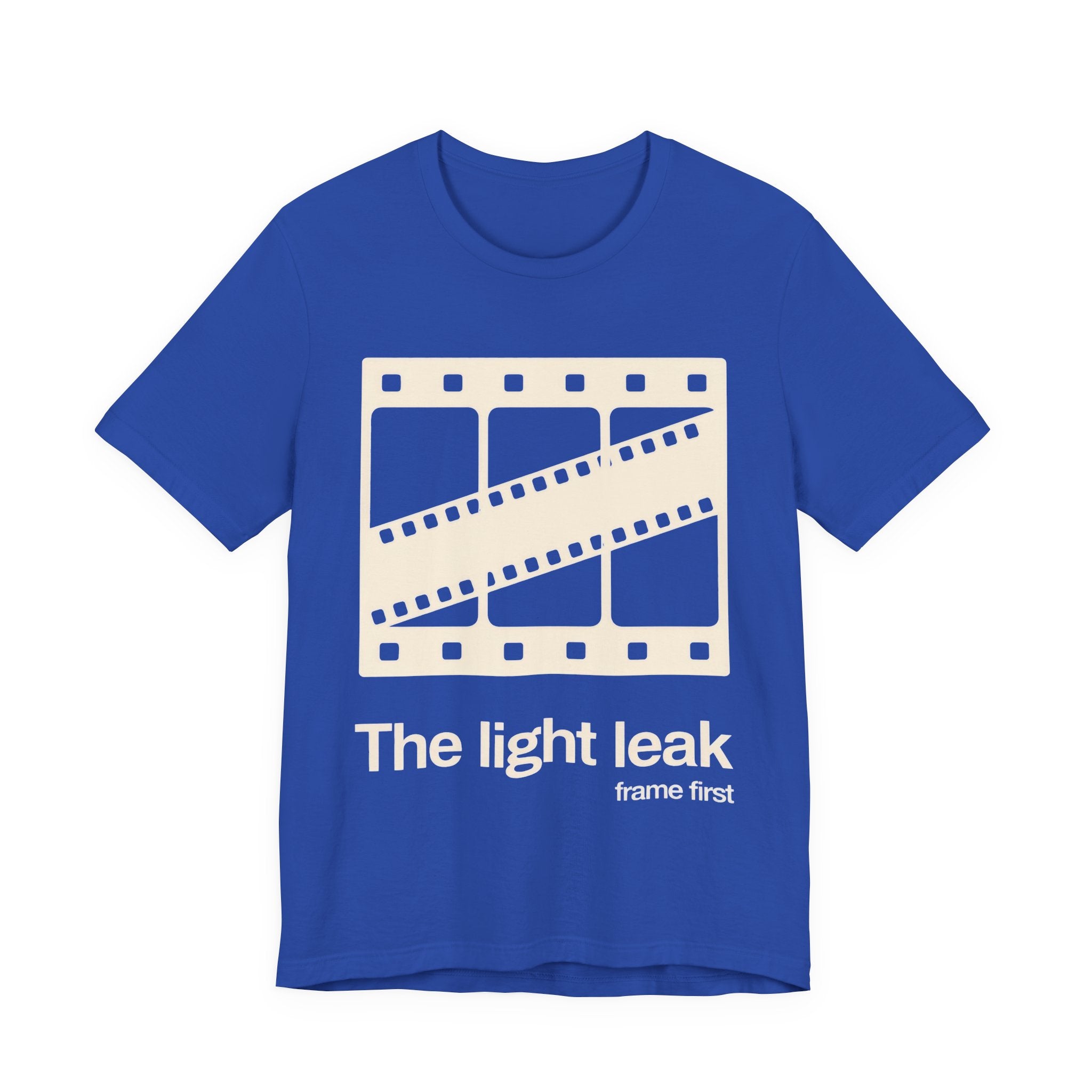 Blue t-shirt with a film reel design and white 'The light leak frame first' text on a white background