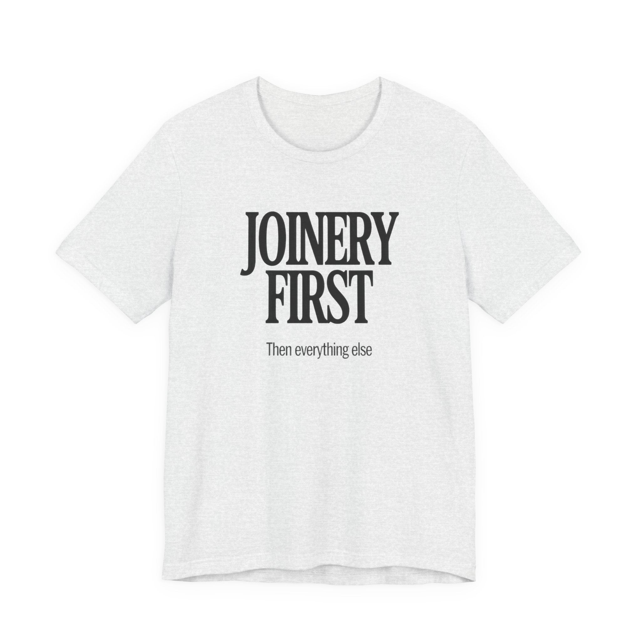 White t-shirt with 'JOINERY FIRST Then everything else' text on a white background
