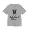 Gray t-shirt with black graphic and text 'Bully Breed Believer' on a white background