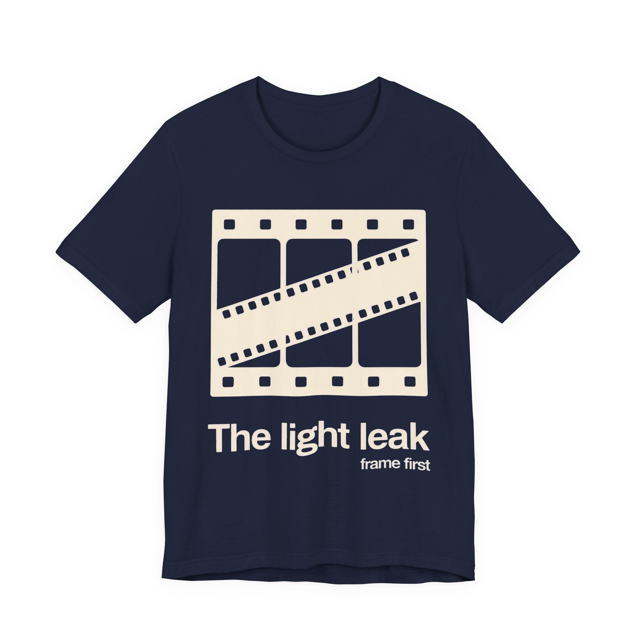 Navy t-shirt with a film reel design and white 'The light leak frame first' text on a white background