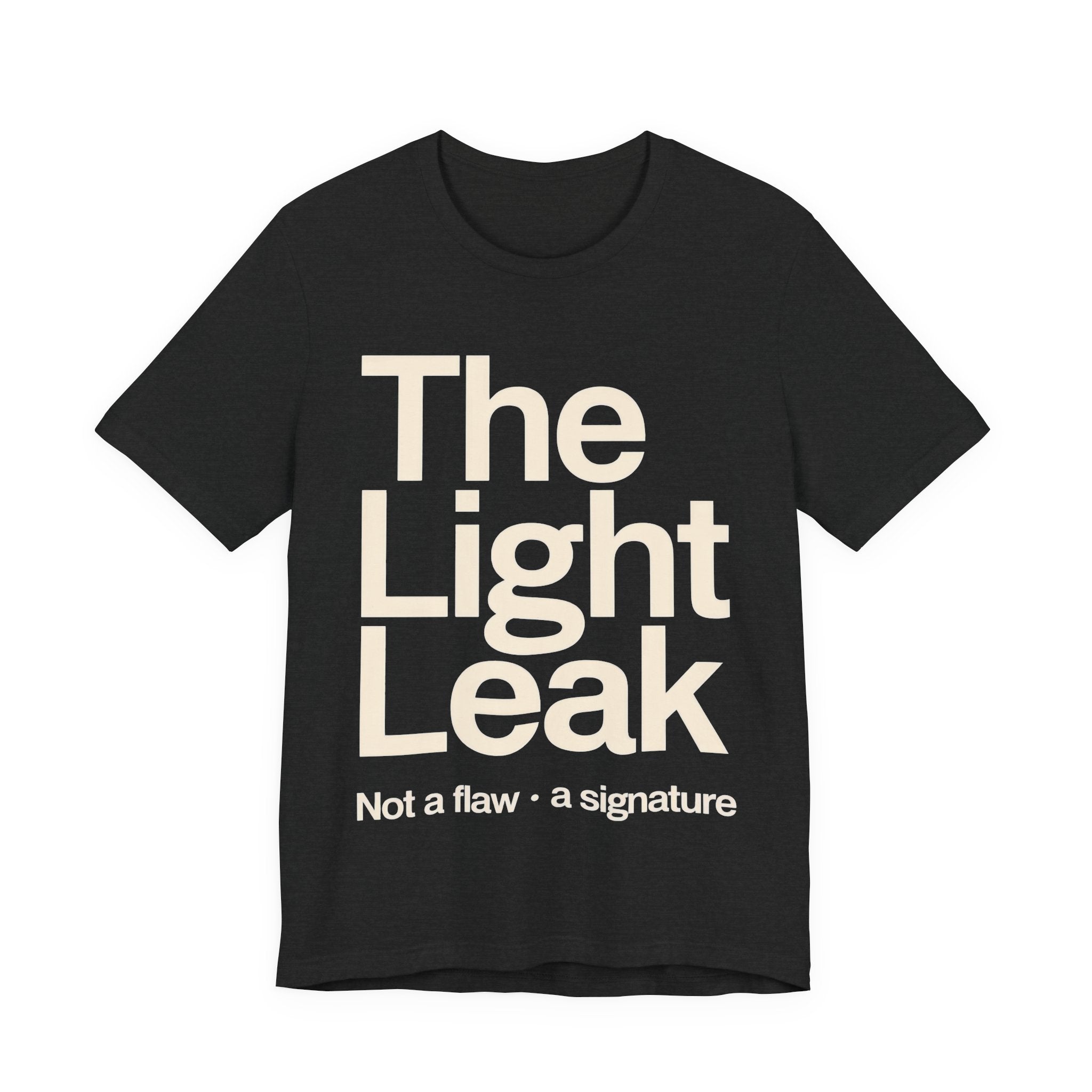 Black t-shirt with 'The Light Leak Not a flaw, a signature' text on a white background