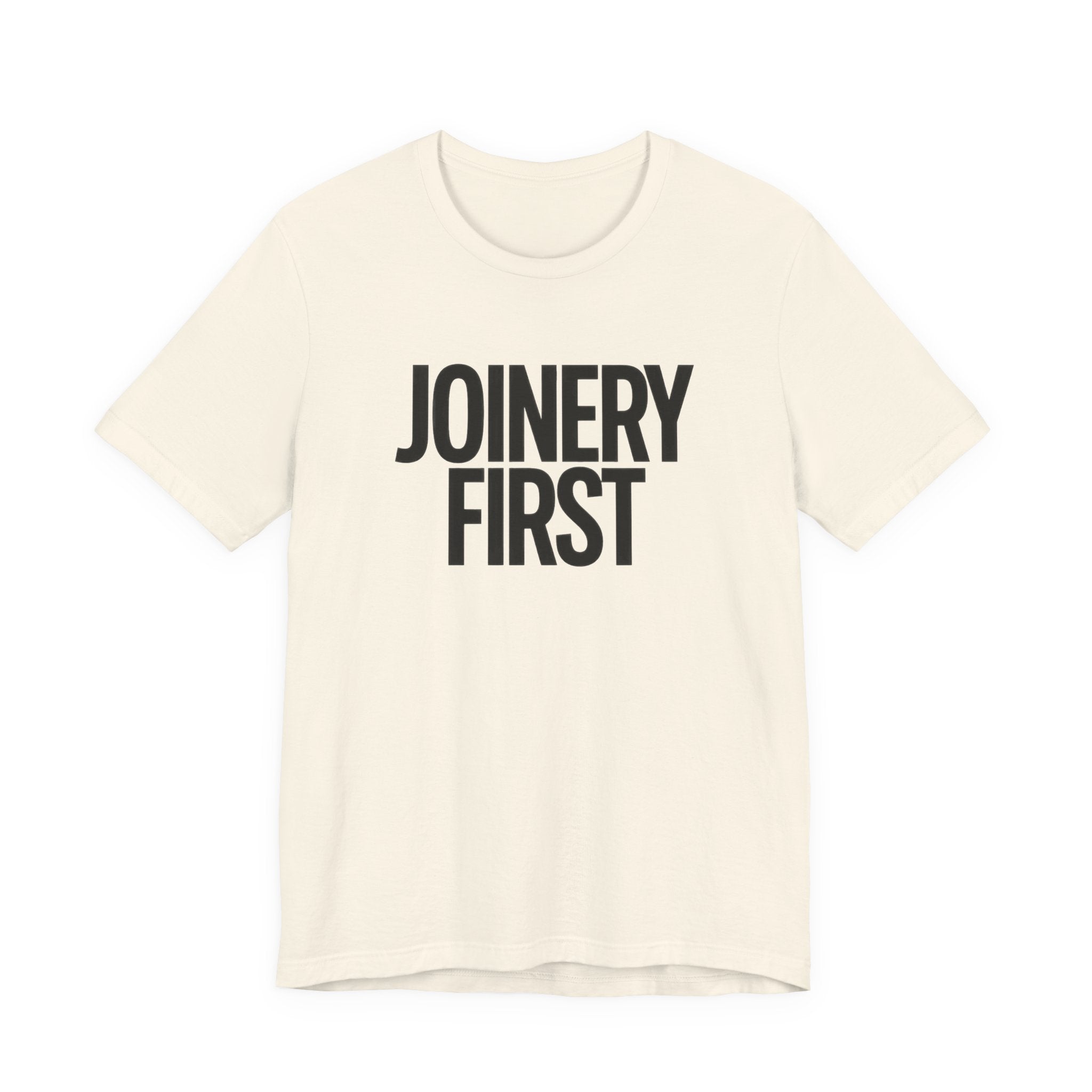 Beige t-shirt with 'JOINERY FIRST' text on a white background