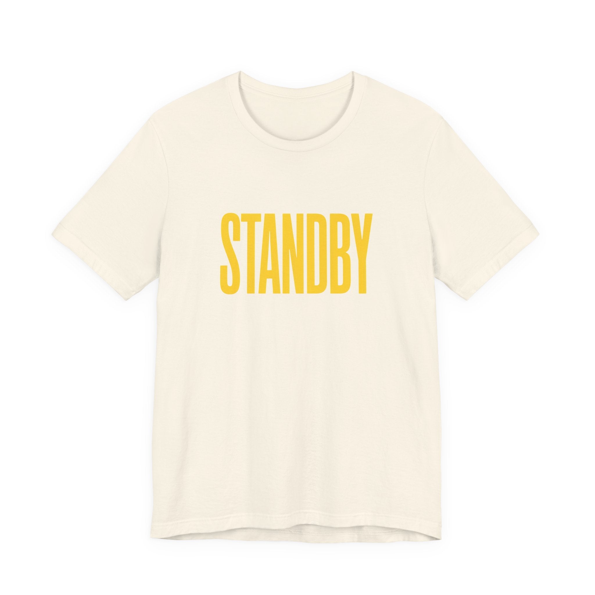 Beige t-shirt with 'STANDBY' text in yellow on a white background