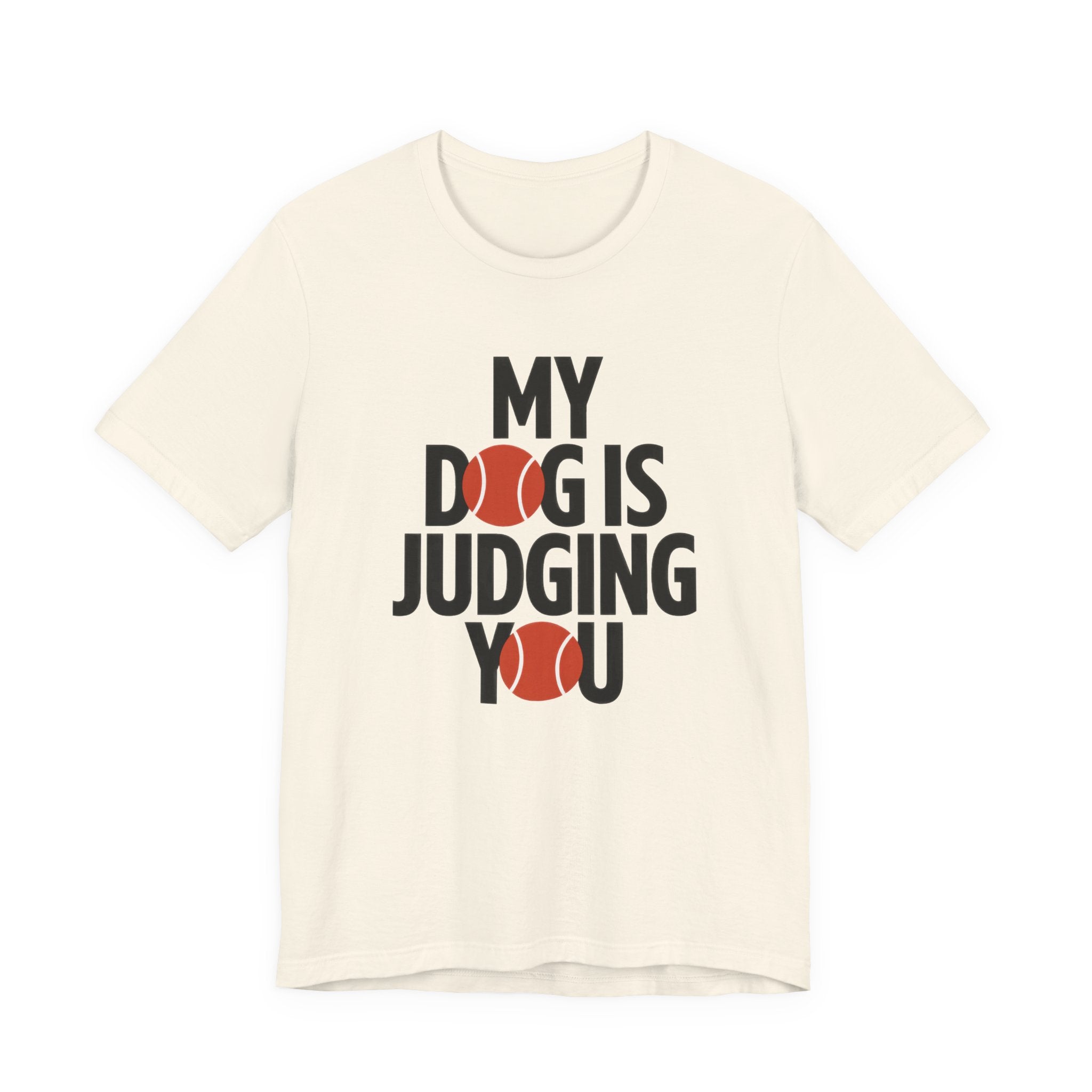 Beige t-shirt with text 'My dog is judging you' on a white background
