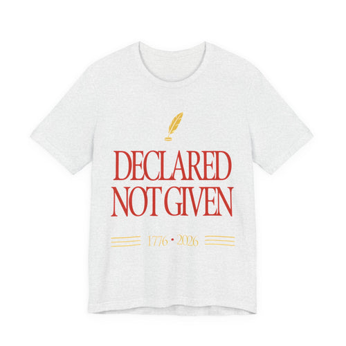 White t-shirt with red text 'Declared Not Given' and a yellow feather on a white background